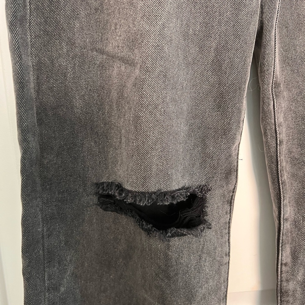 Distressed black jeans